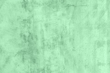 Trendy Neo mint colored low contrast Rough Concrete textured background to your concept or product. Color of the year 2020