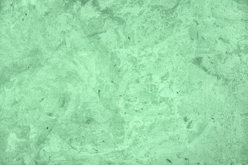 Trendy Neo mint colored low contrast Rough Concrete textured background to your concept or product. Color of the year 2020
