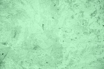 Trendy Neo mint colored low contrast Rough Concrete textured background to your concept or product. Color of the year 2020