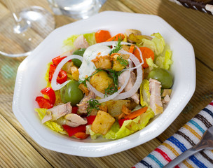 Salad with chicken, eggplants, greens