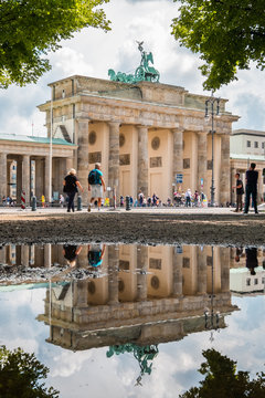 The Brandenburger Tor / Brandenburg Gate reflection in puddle, Berlin