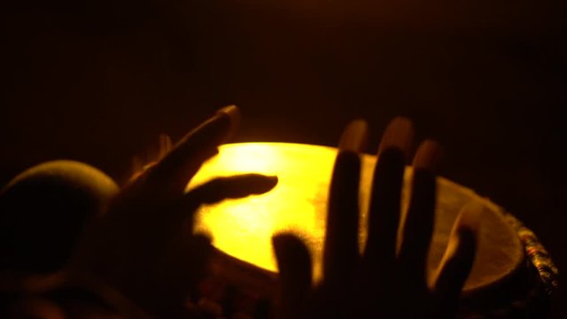 Percussionist playing bata drums in Africa