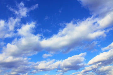 Naklejka na ściany i meble Beautiful cumulus clouds. Close-up. Background. Landscape.