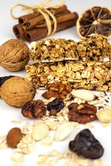 Muesli bar on a white background. Healthy food. Protein diet. Healthy sweetness. Oatmeal and dried fruits.