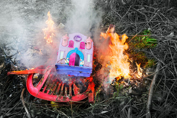 Burning plastic household