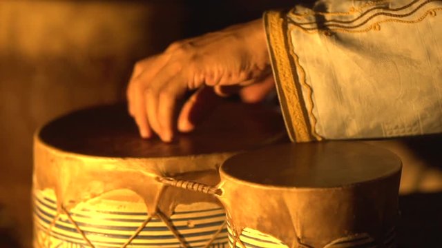 Percussionist playing bata drums in Africa