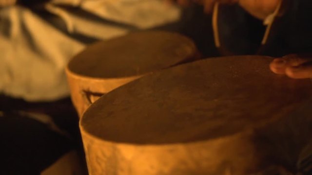 Percussionist playing bata drums in Africa