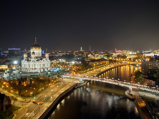 Cathedral of Christ the Savior in Moscow near river, Russia at night. Aerial drone view