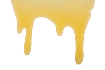 Honey drips isolated on white background
