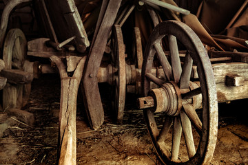 Fototapeta na wymiar old wooden carriage wheel