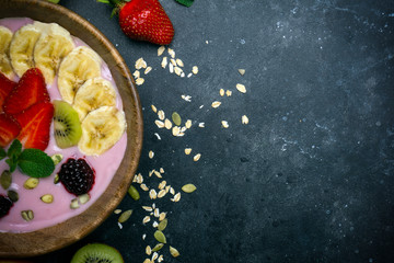 Yogurt smoothie bowl. Vegetarian healthy food (berries, yogurt, muesli, fruit)
