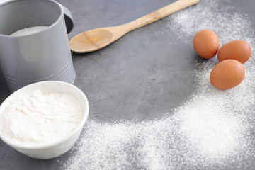 Baking background with eggs, flour .Copy space. Selective focus