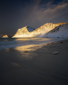 Snow covered Haukland Beach at sunset, Lofoten, Nordland, Norway, Europe