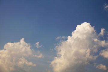 Amazing white fluffy clouds and blue sky on the background, Spring in Georgia USA.