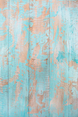 Fototapeta na wymiar Blauer Holzhintergrund mit abblätternden Farbe 