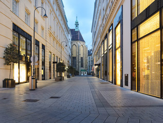 Colorful street with the church in Vienna, Austria