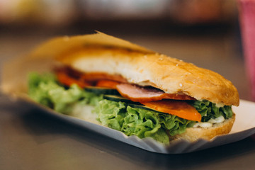 close up photo of sandwich in cafe table