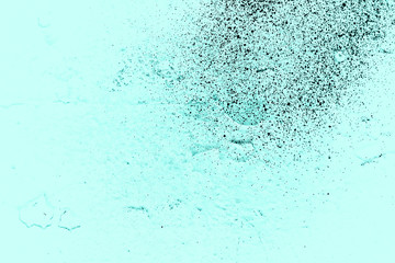 Vintage azure background. Rough painted wall of turquoise color. Imperfect plane of cyan colored. Uneven old decorative toned backdrop of aqzure tint. Texture of teal hue. Ornamental stony surface.