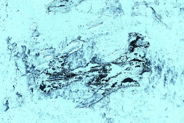 Vintage blue background. Rough painted wall of sapphire color. Imperfect plane of blue colored. Uneven old decorative toned backdrop of cyan tint. Texture of sapphirine hue. Ornamental stony surface.