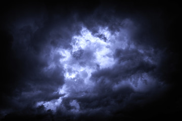 Naklejka na ściany i meble Thunder Sky. The sky is covered with gloomy rain clouds as a background.