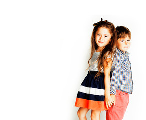 little cute boy and girl hugging playing on white background, happy family smiling close up