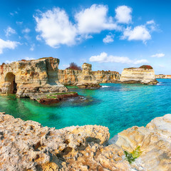 Picturesque seascape with cliffs, rocky arch at Torre Sant Andrea