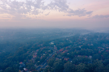 Rural Fire Services (RFS) Hazard reduction burns create smoke and haze over Sydney basin, reducing visibility and increasing risk of asthma and respiratory problems