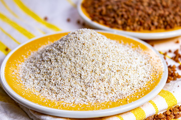Healthy diet superfood buckwheat groats and flour used for making delicious pasta, noodles, pancaces and kasha in many countries.