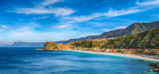 Beautiful seaside town village Scilla with old medieval castle on rock Castello Ruffo