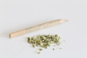 Close-up of Marijuana Joint in a White Background.Legal Weed.