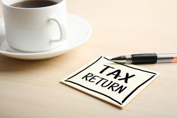 Tax Return Concept On Sticky Note