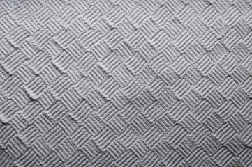 Woven cross-hatch pattern hand-raked into an abstract textured background in the monochrome white...
