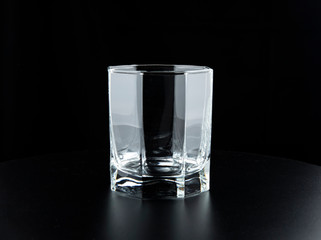 Empty glass on a black background