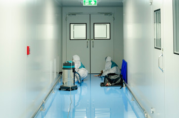 Employees use a vacuum cleaner with a HEPA filter cleaner. , Clean room