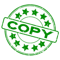 Grunge green copy word with star icon round rubber seal stamp on white background