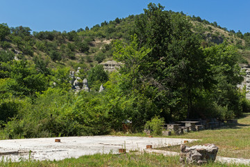 Fototapeta premium Landscape with Rock formation The Stone Dolls of Kuklica near town of Kratovo, Republic of North Macedonia