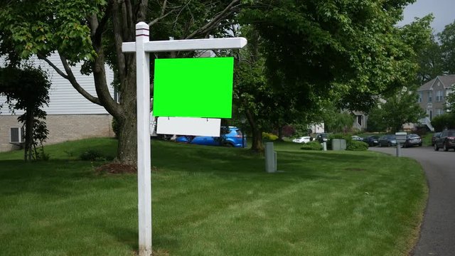 Green Screen real estate for sale sign in suburban area