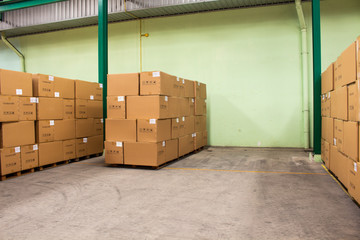 The rows of material boxes or product boxes in warehouse area.