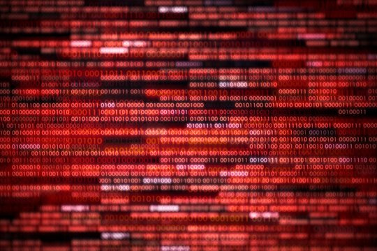 corrupted data. red binary code with missing pieces. computer technology problem virus error darknet and hacking background. computer language data transfers. network hacked compromised.