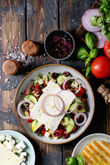 Feta cheese salad in ceramic bowl