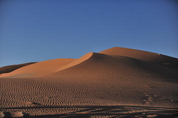 Fototapeta na wymiar Texture of sand in the desert. Namibia. Sossusflay.