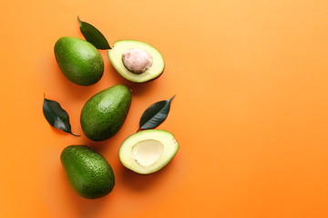 Fresh avocado on color background - obrazy, fototapety, plakaty