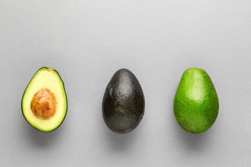 Fresh avocado on grey background