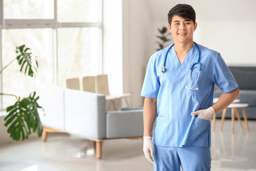 Male medical assistant in clinic