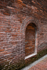 Fototapeta na wymiar A niche of the brick wall
