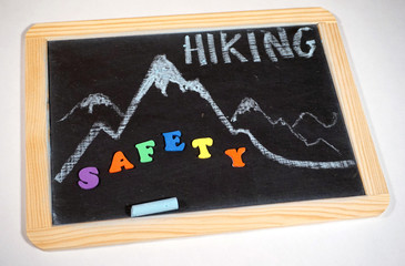 Hiking safety message on chalkboard