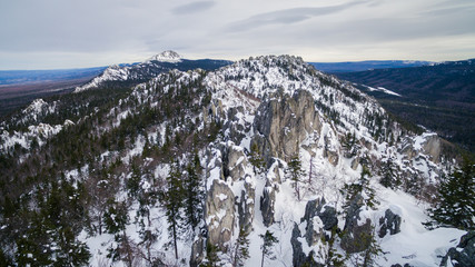 Ural range in winter day view from drone in taganay national park