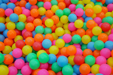 Fototapeta na wymiar Colorful many plastic balls in Ball pit for kid activity in child playground