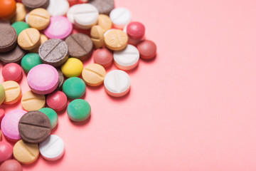 Fototapeta na wymiar Pile of colored pills, capsule and tablets