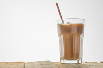Iced coffee on a white background, with copy space. Cool summer drink
